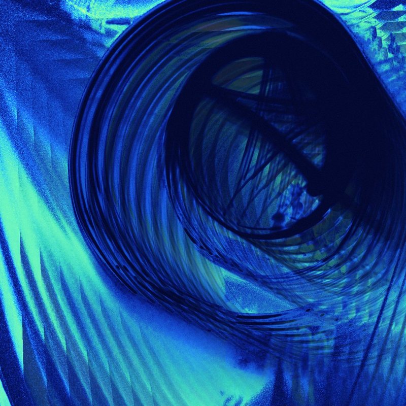 The light painting in deep blues, its rings turned to dark smoke with a black centre.