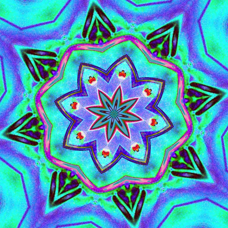 The light painting folded into a many-pointed flower in violet, green and pale blue.