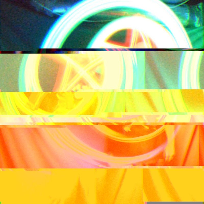 The light painting cut into shifted horizontal bands of yellow and orange, the way a damaged JPEG opens.