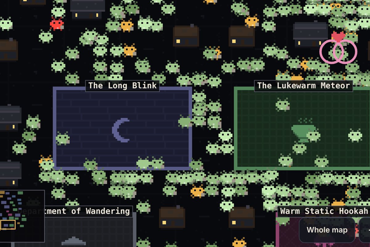 A close view of the pocket colony: dozens of small green pixel creatures crowding around two buildings, with a pink double ring where two of them have just paired.